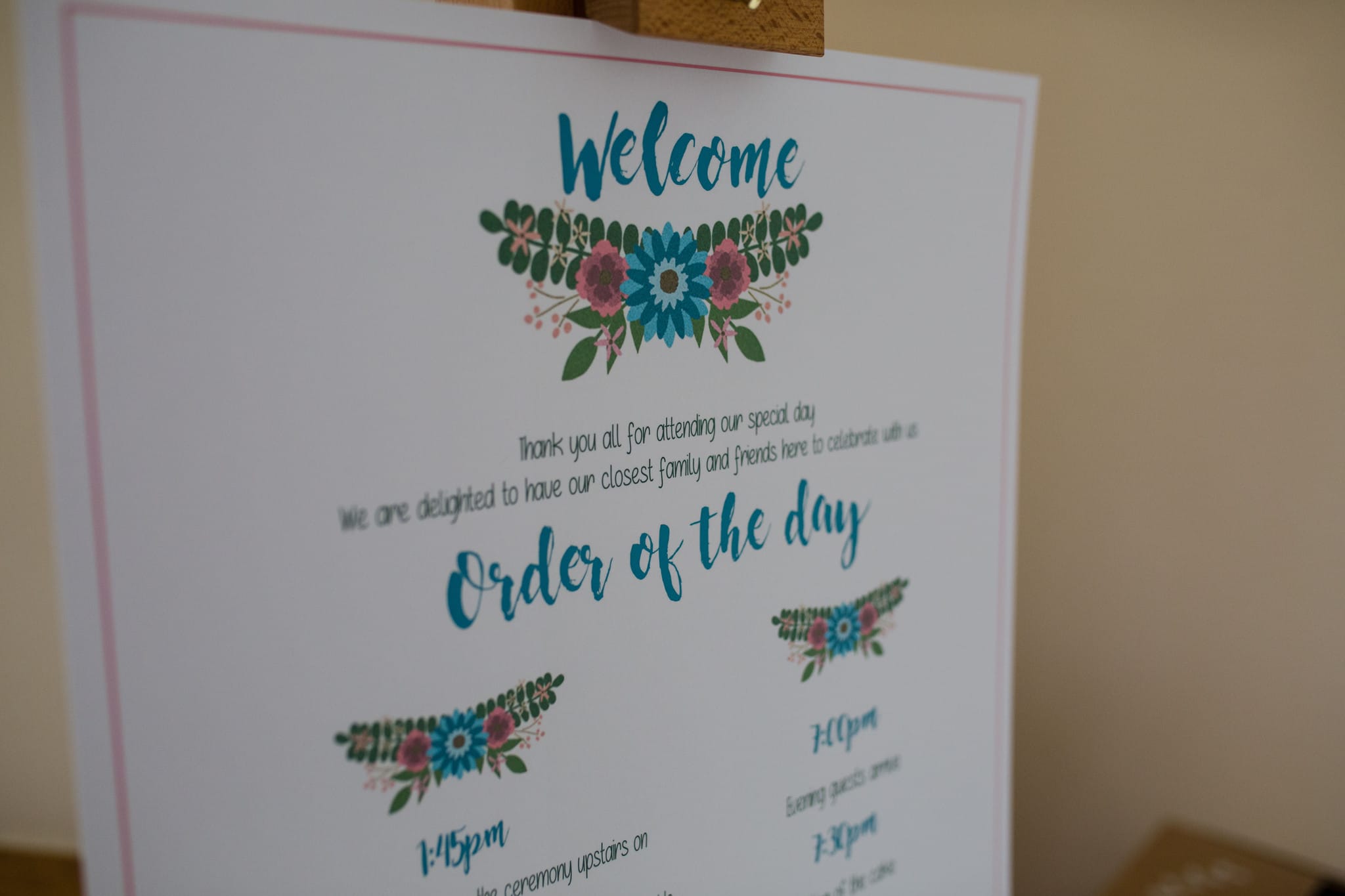 Order of the day sign with hand painted cake images Delbury Hall