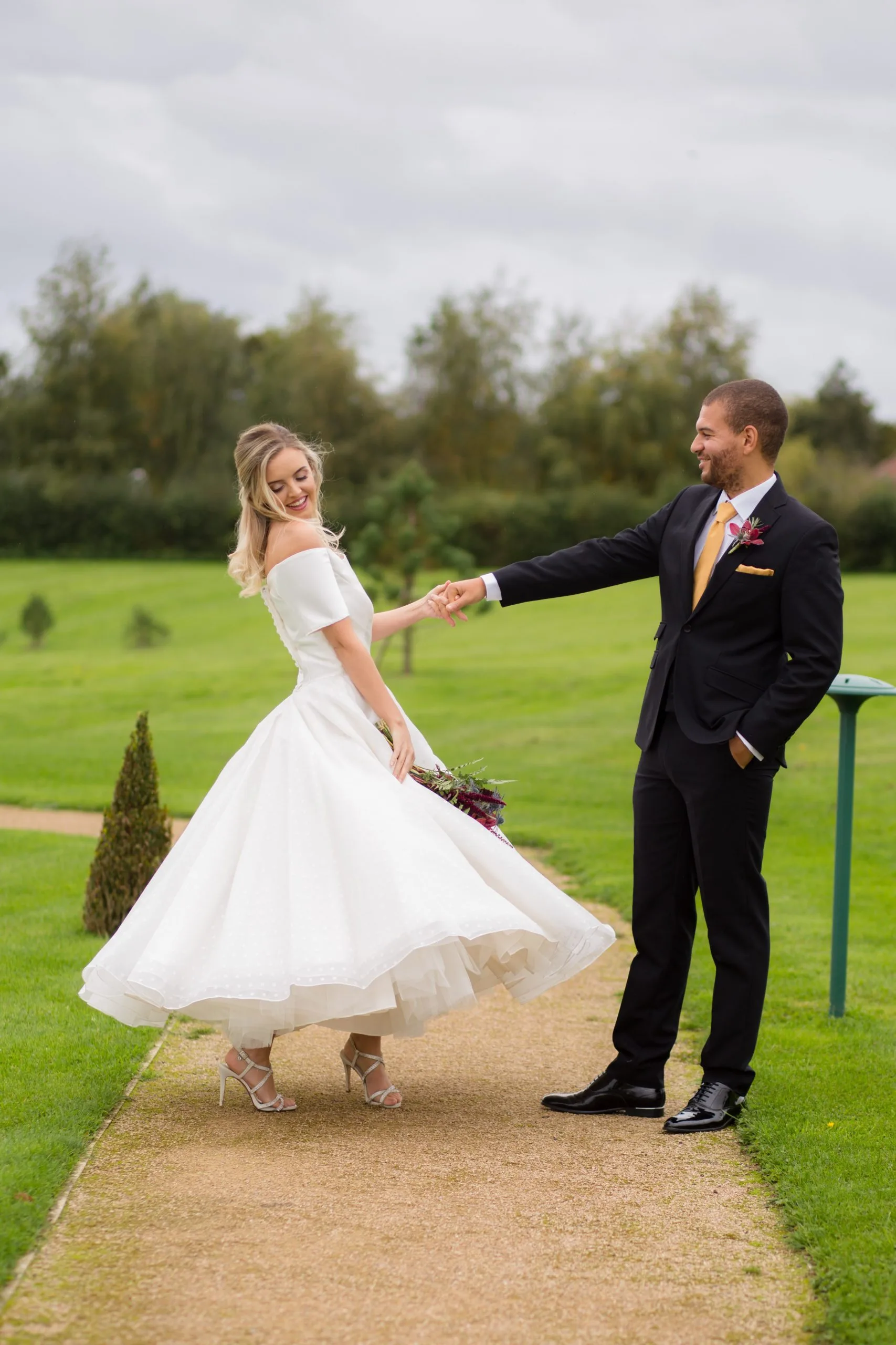 A couple dancing on their wedding day at the hencote vineyard in Shrewsbury