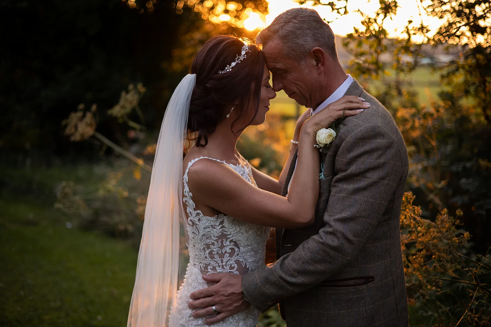 Rowton Castle wedding Nicola Gough Photography A couple on their wedding day at sunset