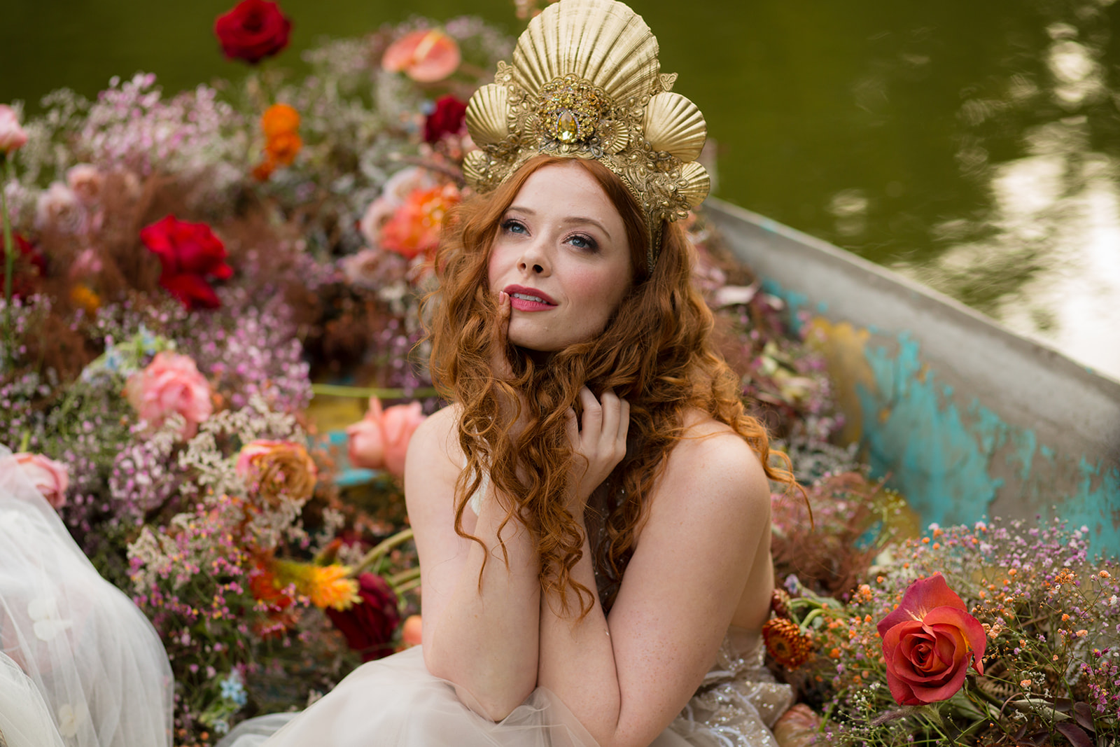 Walcot hall wedding with mermaid theme on lake in boat