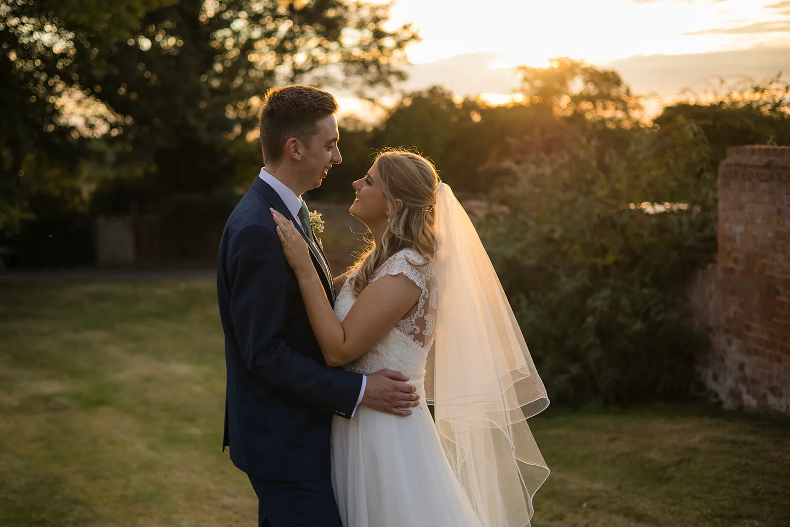 Albrighton Hall Wedding sunset wedding photo of a couple within the gardens of a Shrewsbury wedding venue
