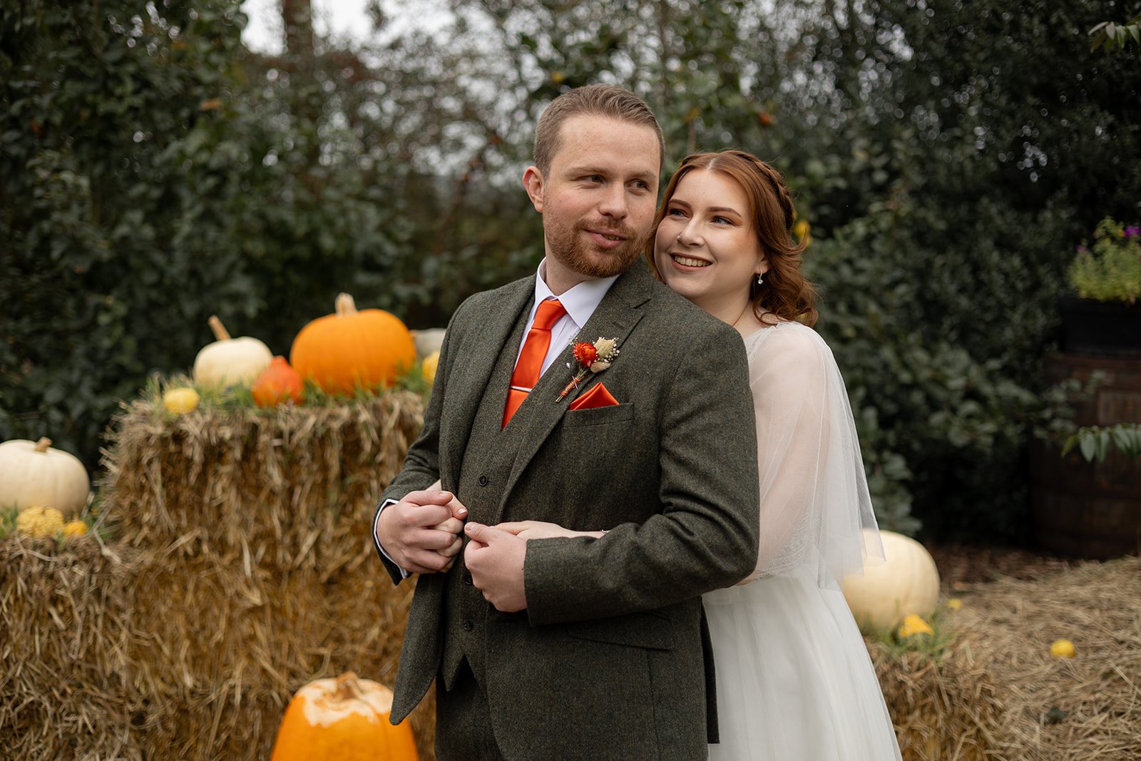a wedding couple posing at the Wroxeter wedding venue at autumn
